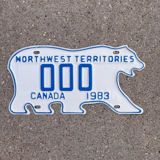 Photo of a 1983 Northwest Territories Sample License Plate Auto Tag Garage Decor Vintage Polar Bear 000