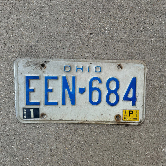 Photo of a 1983 Ohio License Plate Auto Tag Garage Decor Vintage EEN 684