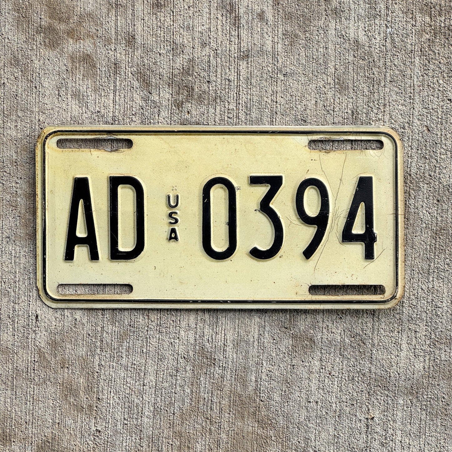 Photo of a 1983 US Forces Germany License Plate Auto Tag 1 Vintage Garage AD 0394 with original patina