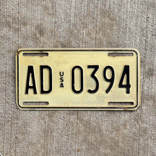 Photo of a 1983 US Forces Germany License Plate Auto Tag 2 Vintage Garage AD 0394 with original patina