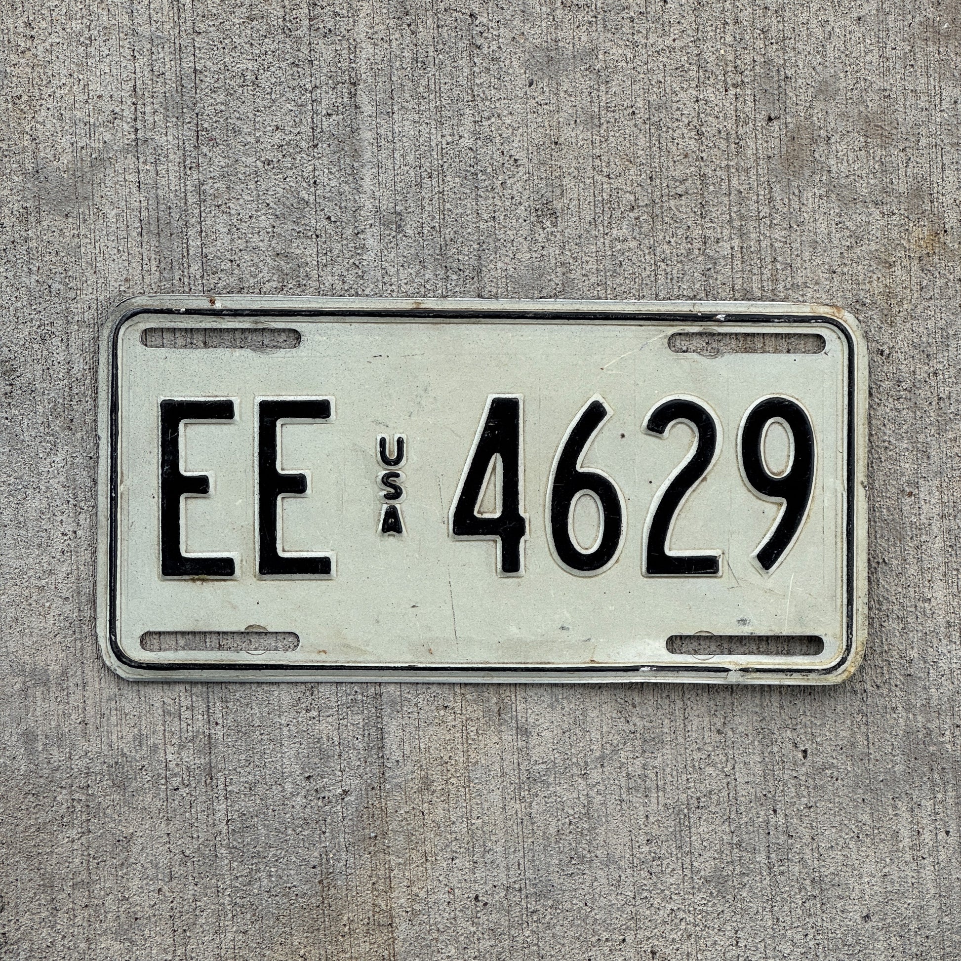 Photo of a 1983 US Forces Germany License Plate Auto Tag Garage Decor Vintage EE 4629 with original patina