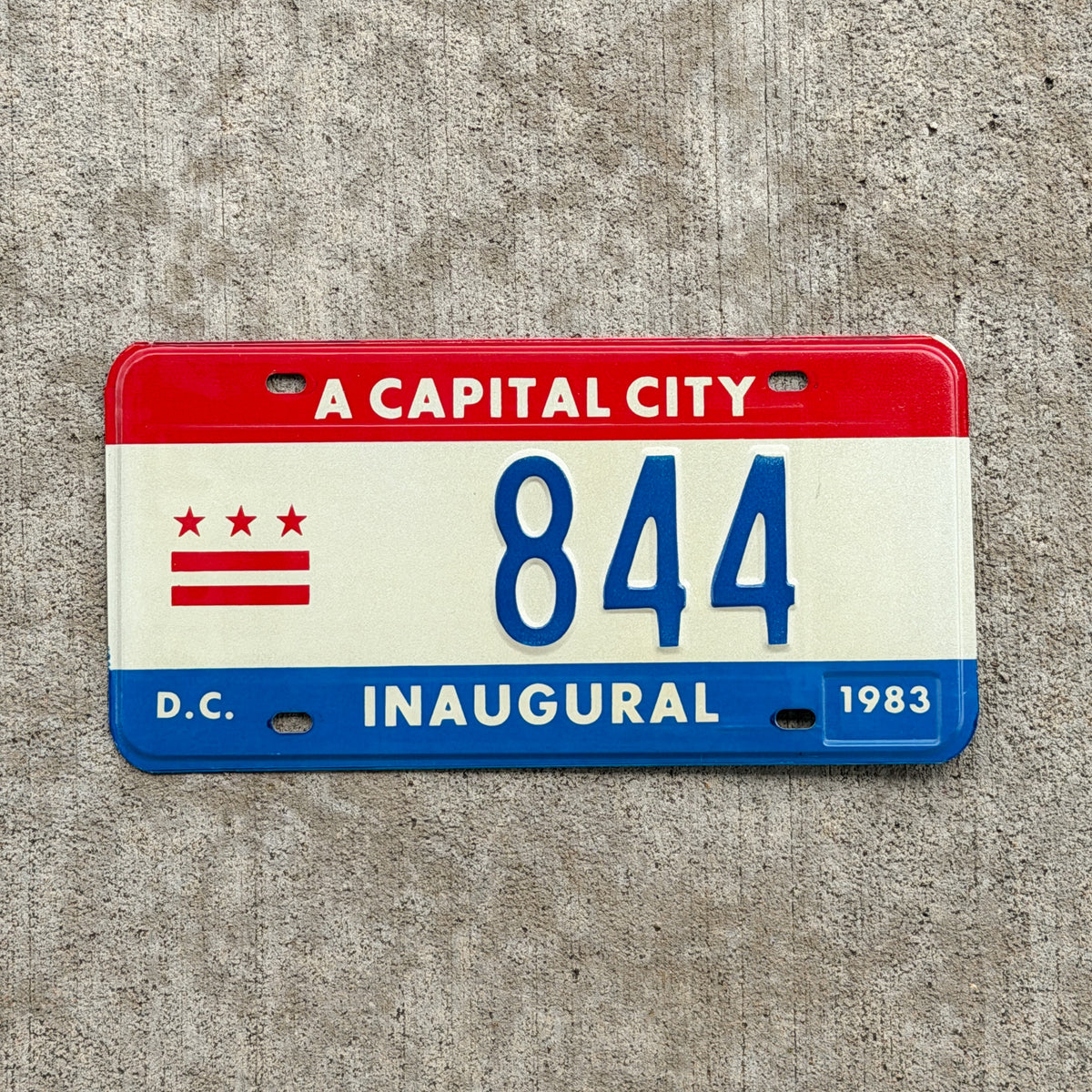 Photo of a 1983 Washington DC Inaugural License Plate Auto Tag 1 Vintage Garage Mayor Mayoral Election Marion Barry 844 with original patina