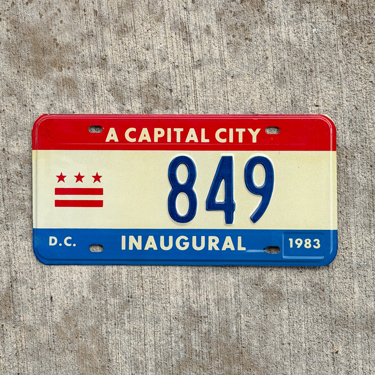 Photo of a 1983 Washington DC Inaugural License Plate Auto Tag 1 Vintage Garage Mayor Mayoral Election Marion Barry 849 with original patina