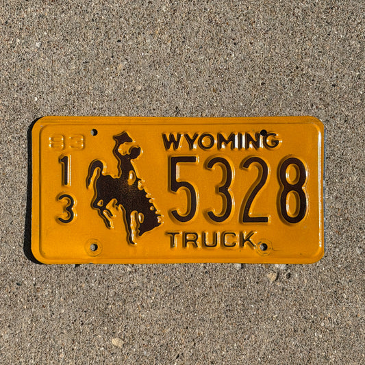 Photo of a 1983 Wyoming Truck License Plate Auto Tag Garage Decor Vintage Cowboy Rodeo 13 5328 with original patina