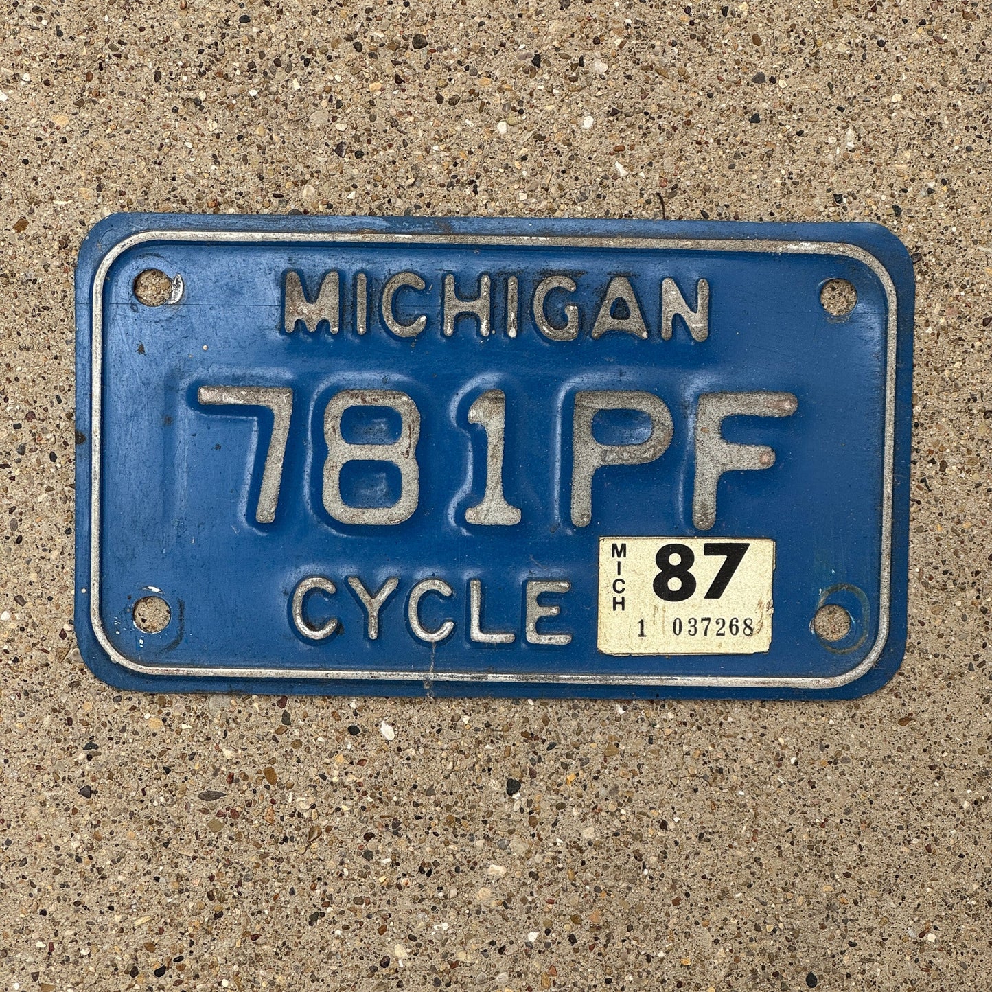 Photo of a 1984 1987 Michigan Motorcycle License Plate Auto Tag Garage Decor Vintage 781 PF