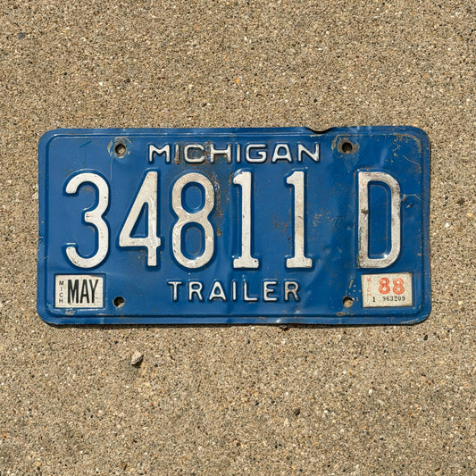 Photo of a 1984 1988 Michigan Trailer License Plate Auto Tag Garage Decor Vintage 34811 D with original patina