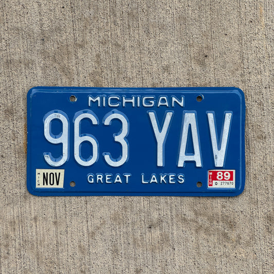 Photo of a 1984 1989 Michigan License Plate Auto Tag Garage Decor Vintage 963 YAV with original patina