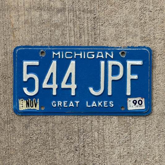 Photo of a 1984 1990 Michigan License Plate Auto Tag Garage Decor Vintage 544 JPF with original patina