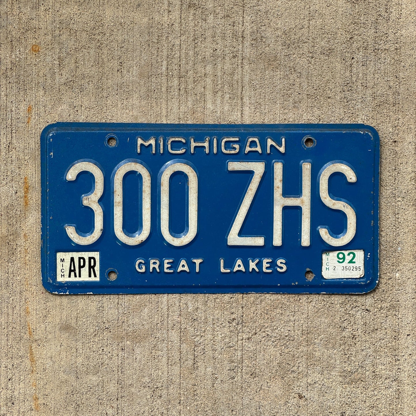 Photo of a 1984 1992 Michigan License Plate Auto Tag Garage Decor Vintage 300 ZHS