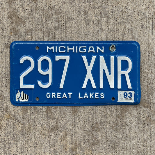 Photo of a 1984 1993 Michigan License Plate Auto Tag Garage Decor Vintage 297 XNR with original patina