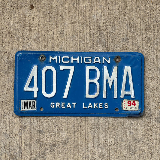 Photo of a 1984 1994 Michigan License Plate Auto Tag Garage Decor Vintage 407 BMA with original patina