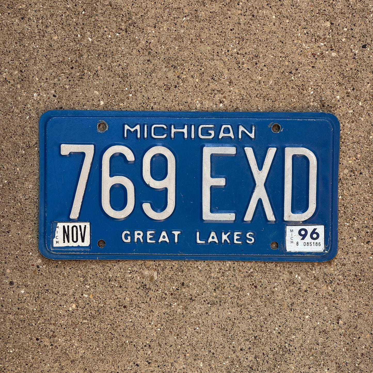 Photo of a 1984 1996 Michigan License Plate Auto Tag Garage Decor Vintage 769 EXD