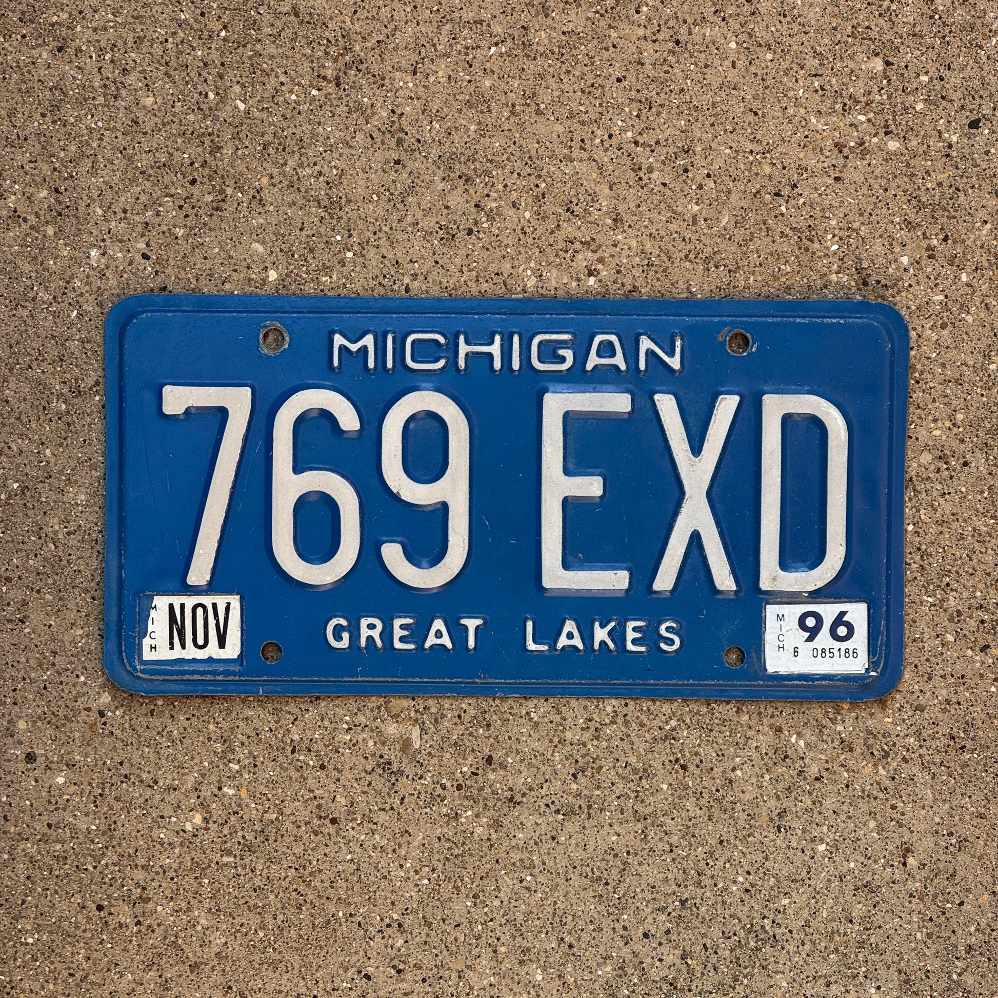 Photo of a 1984 1996 Michigan License Plate Auto Tag Garage Decor Vintage 769 EXD