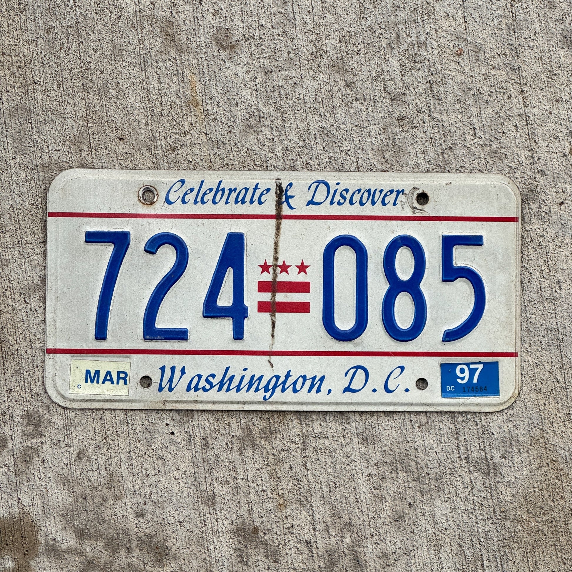 Photo of a 1984 1997 Washington DC License Plate Auto Tag Garage Decor Vintage Celebrate and Discover 724 085 with original patina