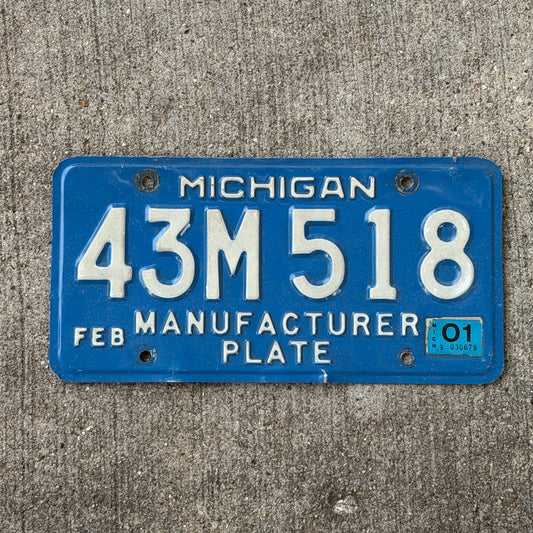 Photo of a 1984 2001 Michigan Manufacturer License Plate Auto Tag Garage Decor Vintage 43 M 518 with original patina