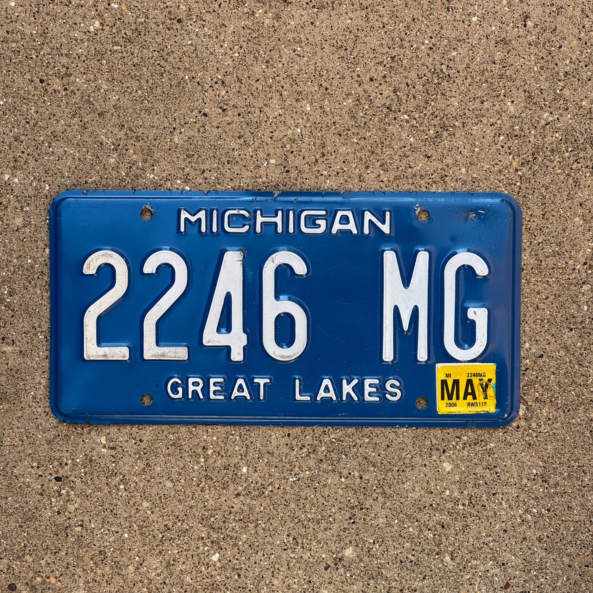 Photo of a 1984 2006 Michigan License Plate Auto Tag Garage Decor Vintage 2246 MG
