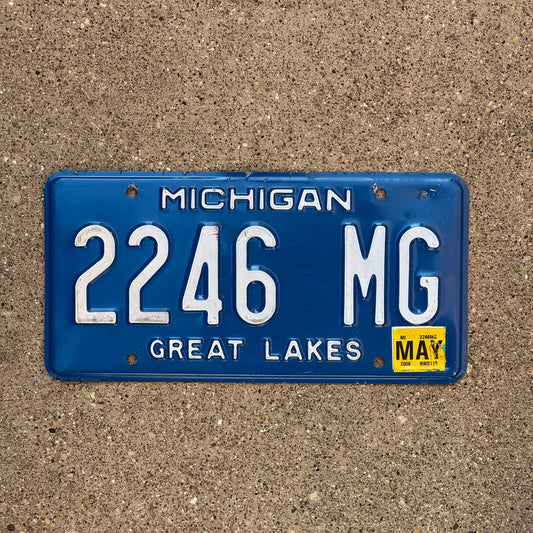 Photo of a 1984 2006 Michigan License Plate Auto Tag Garage Decor Vintage 2246 MG