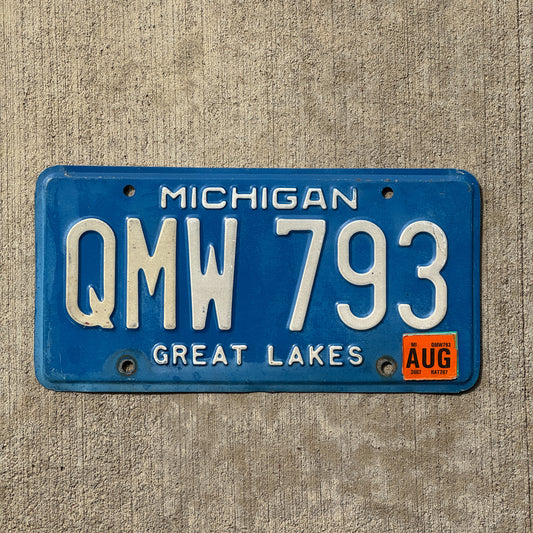 Photo of a 1984 2007 Michigan License Plate Auto Tag Garage Decor Vintage QMW 793 with original patina