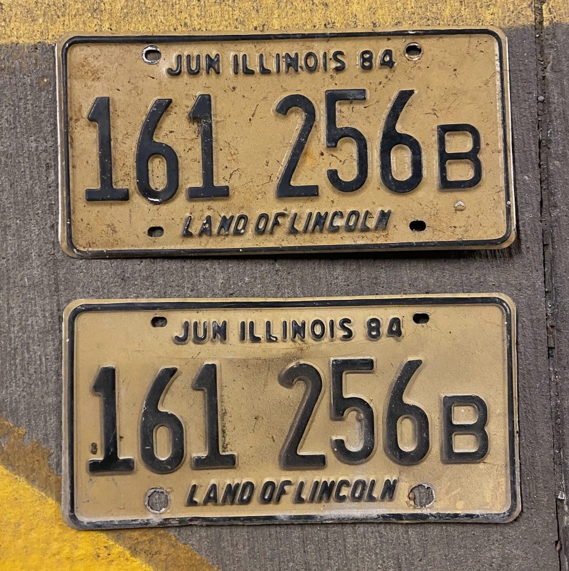 Photo of a 1984 Illinois Truck License Plate Auto Tag Garage Decor Vintage 161 256 B