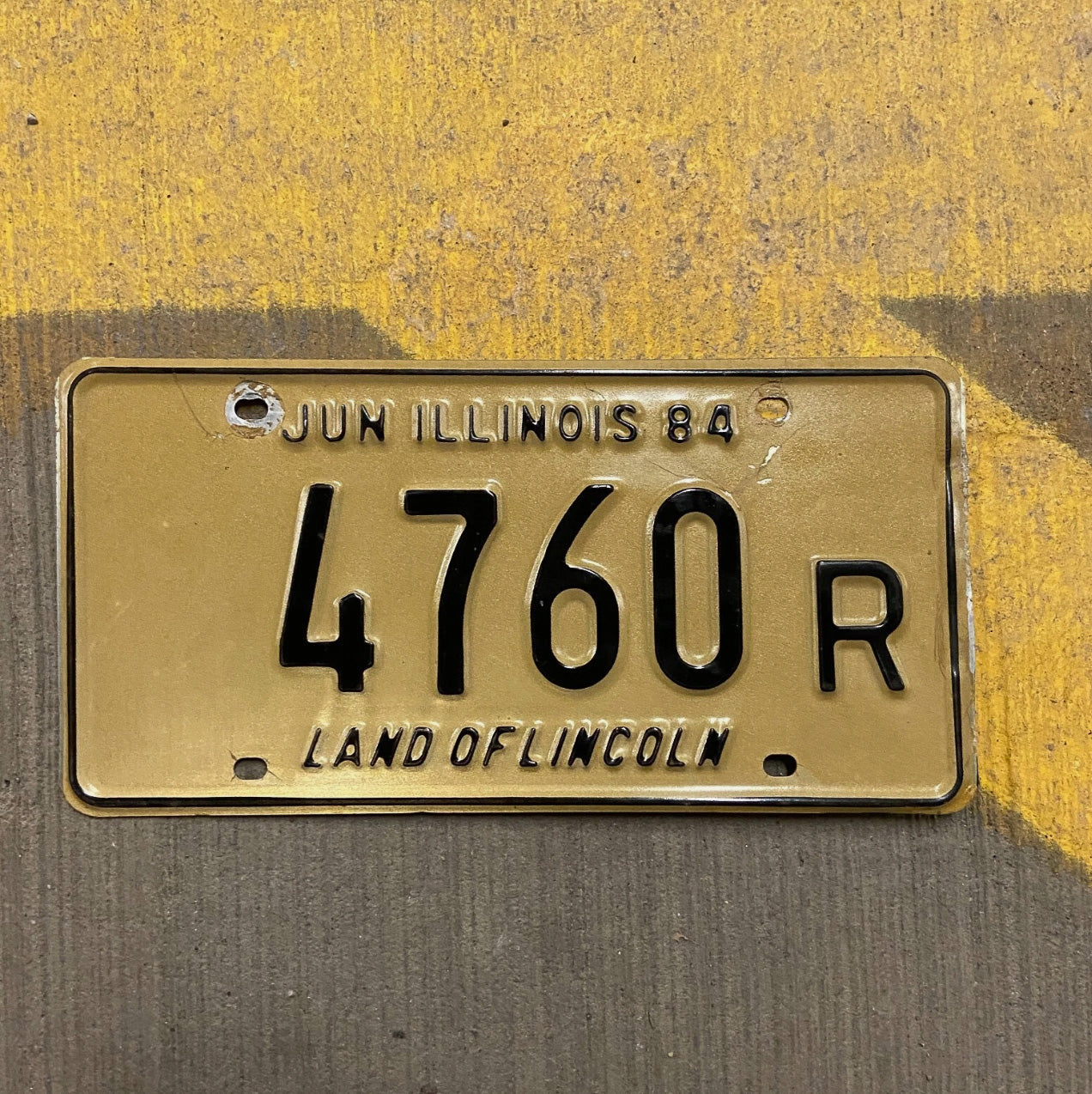 Photo of a 1984 Illinois Truck License Plate Auto Tag Garage Decor Vintage 4760 R with original patina