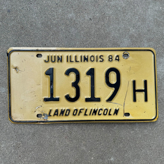 Photo of a 1984 Illinois TRUCK License Plate Auto Tag Garage Decor Vintage License Plate Auto Tag Garage Decor 1319 H