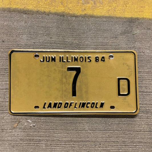 Photo of a 1984 Illinois Truck License Plate Auto Tag Garage Decor Vintage Low Number Single Digit 7 D with original patina