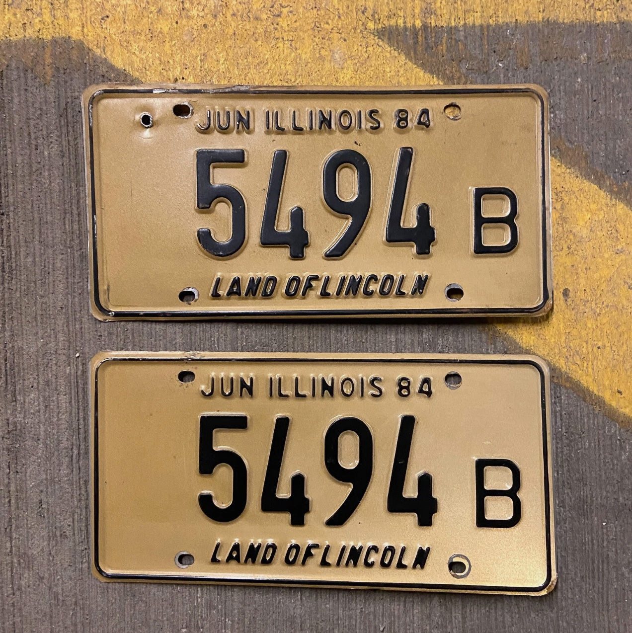 Photo of a 1984 Illinois Truck License Plate Pair Auto Tag Garage Decor Vintage 5494 B with original patina