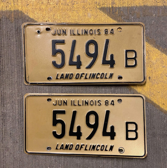 Photo of a 1984 Illinois Truck License Plate Pair Auto Tag Garage Decor Vintage 5494 B with original patina
