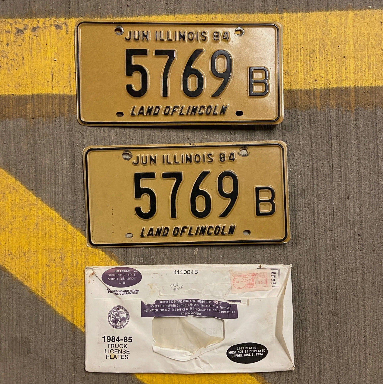 Photo of a 1984 Illinois Truck License Plate Pair Auto Tag Garage Decor Vintage 5769 B with original patina