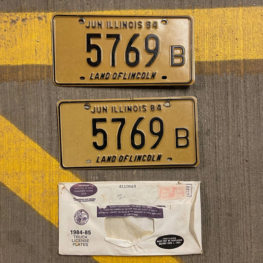 Photo of a 1984 Illinois Truck License Plate Pair Auto Tag Garage Decor Vintage 5769 B with original patina
