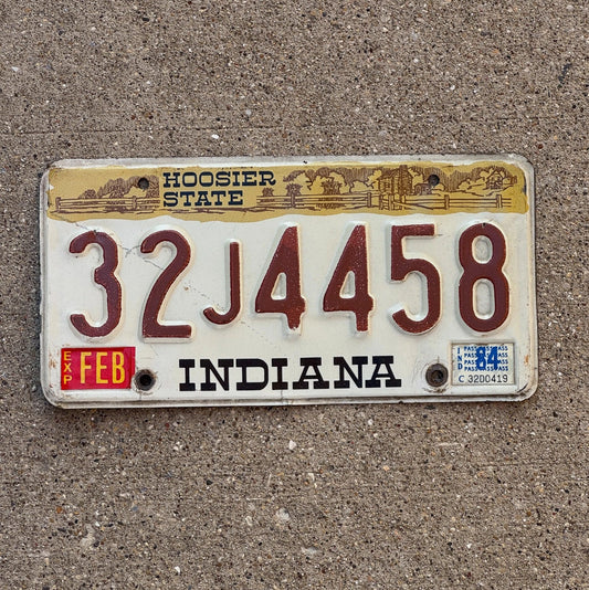 Photo of a 1984 Indiana License Plate Auto Tag Garage Decor Vintage 32 J 4458