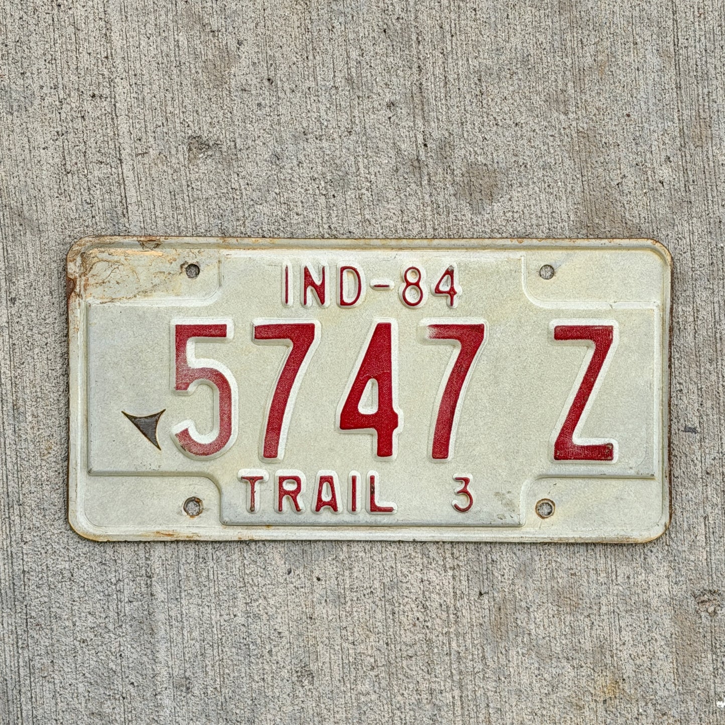 Photo of a 1984 Indiana Trailer License Plate Auto Tag Garage Decor Vintage 5747 Z with original patina