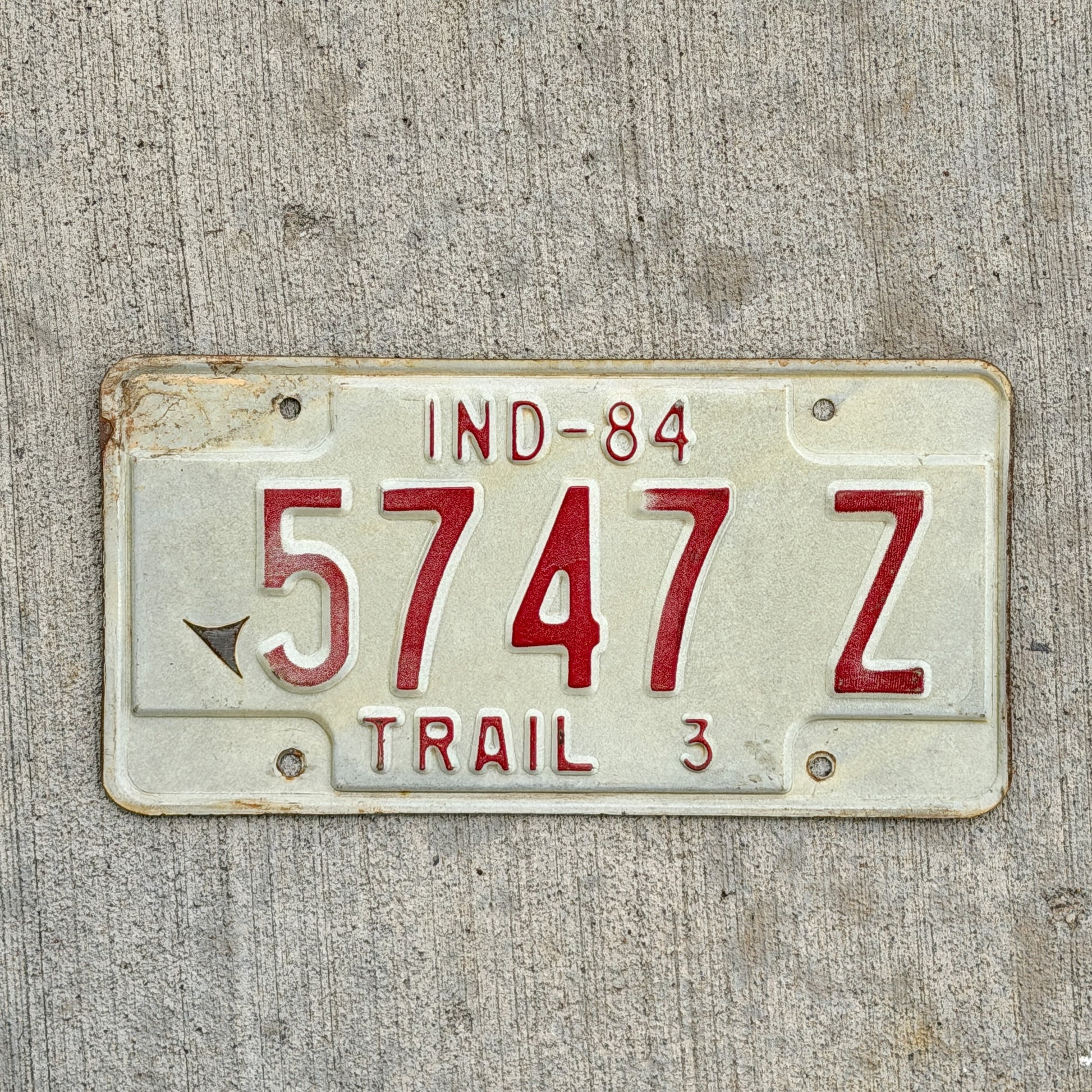 Photo of a 1984 Indiana Trailer License Plate Auto Tag Garage Decor Vintage 5747 Z with original patina