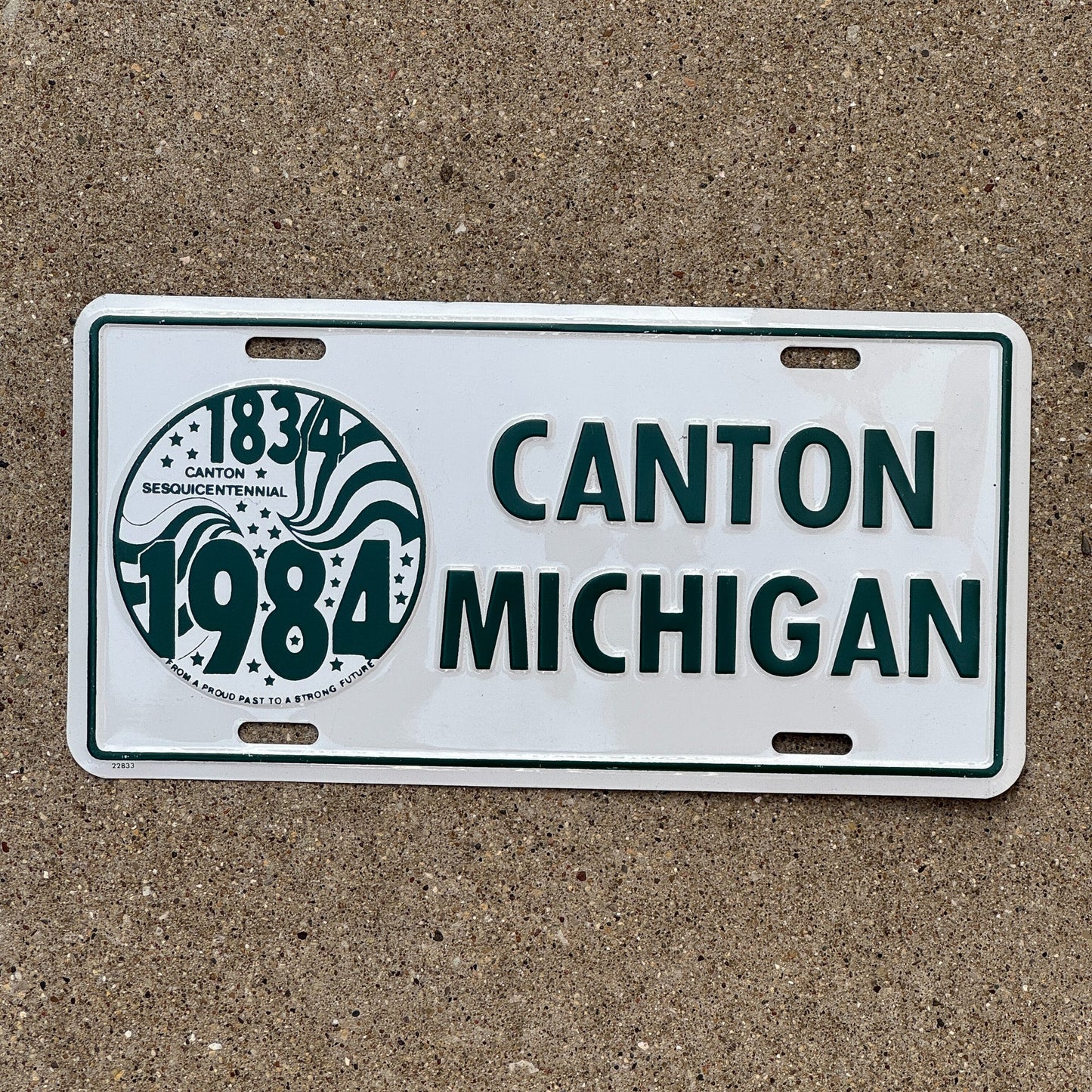 Photo of a 1984 Michigan Booster License Plate Auto Tag Garage Decor Vintage Canton MI