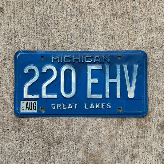Photo of a 1984 Michigan License Plate Auto Tag Garage Decor Vintage 220 EHV with original patina