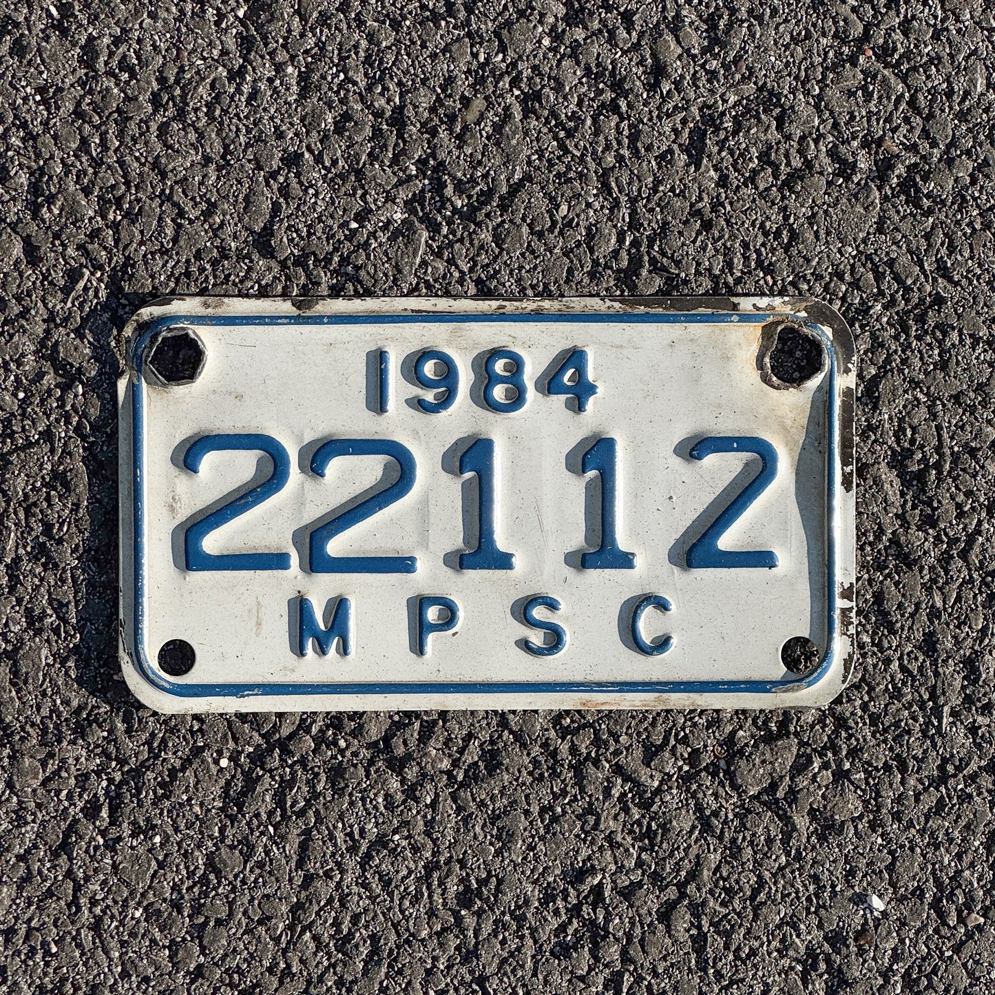 Photo of a 1984 Michigan MPSC License Plate Auto Tag Garage Decor Vintage Public Services Commission 22112