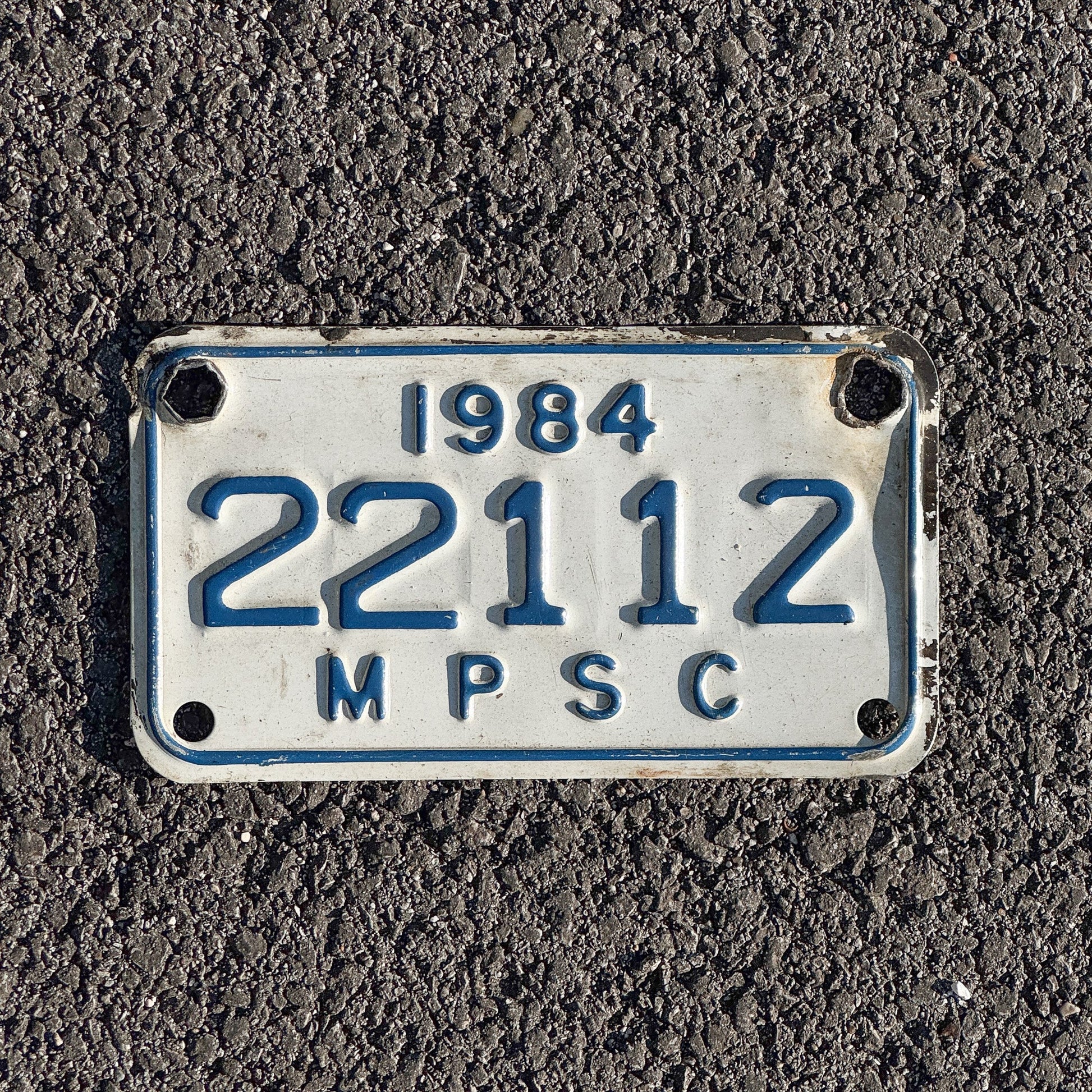 Photo of a 1984 Michigan MPSC License Plate Auto Tag Garage Decor Vintage Public Services Commission 22112