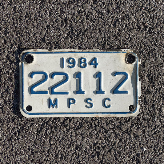 Photo of a 1984 Michigan MPSC License Plate Auto Tag Garage Decor Vintage Public Services Commission 22112