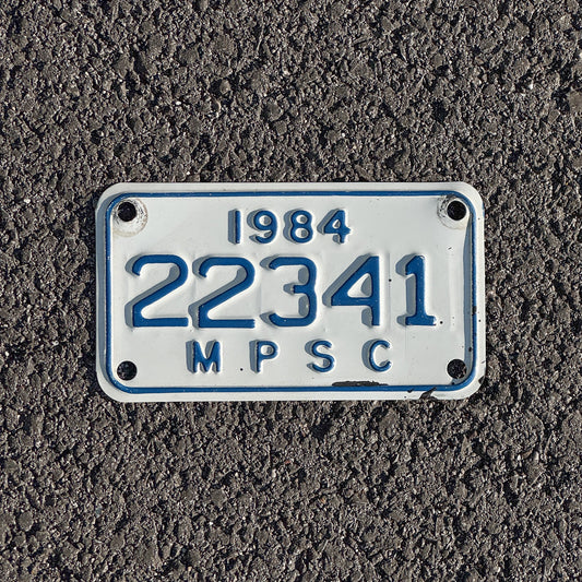 Photo of a 1984 Michigan MPSC License Plate Auto Tag Garage Decor Vintage Public Services Commission 22341
