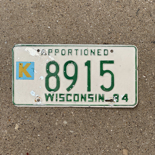 Photo of a 1984 Wisconsin Apportioned License Plate Auto Tag Garage Decor Vintage 8915
