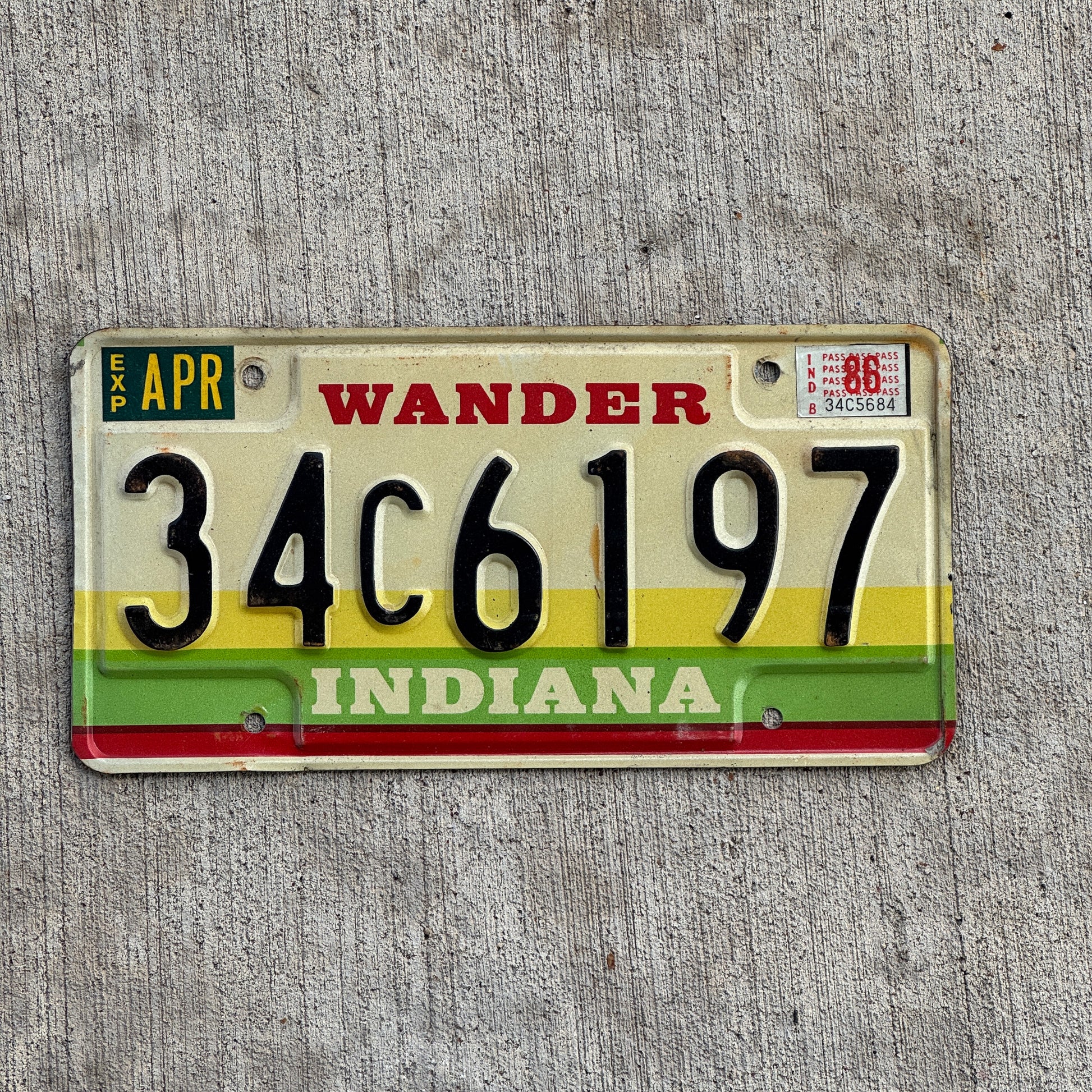 Photo of a 1985 1986 Indiana License Plate Auto Tag Garage Decor Vintage 34 C 6197 with original patina