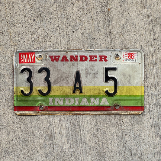 Photo of a 1985 1986 Indiana License Plate Auto Tag Garage Decor Vintage Henry County Low Number 33 A 5 with original patina