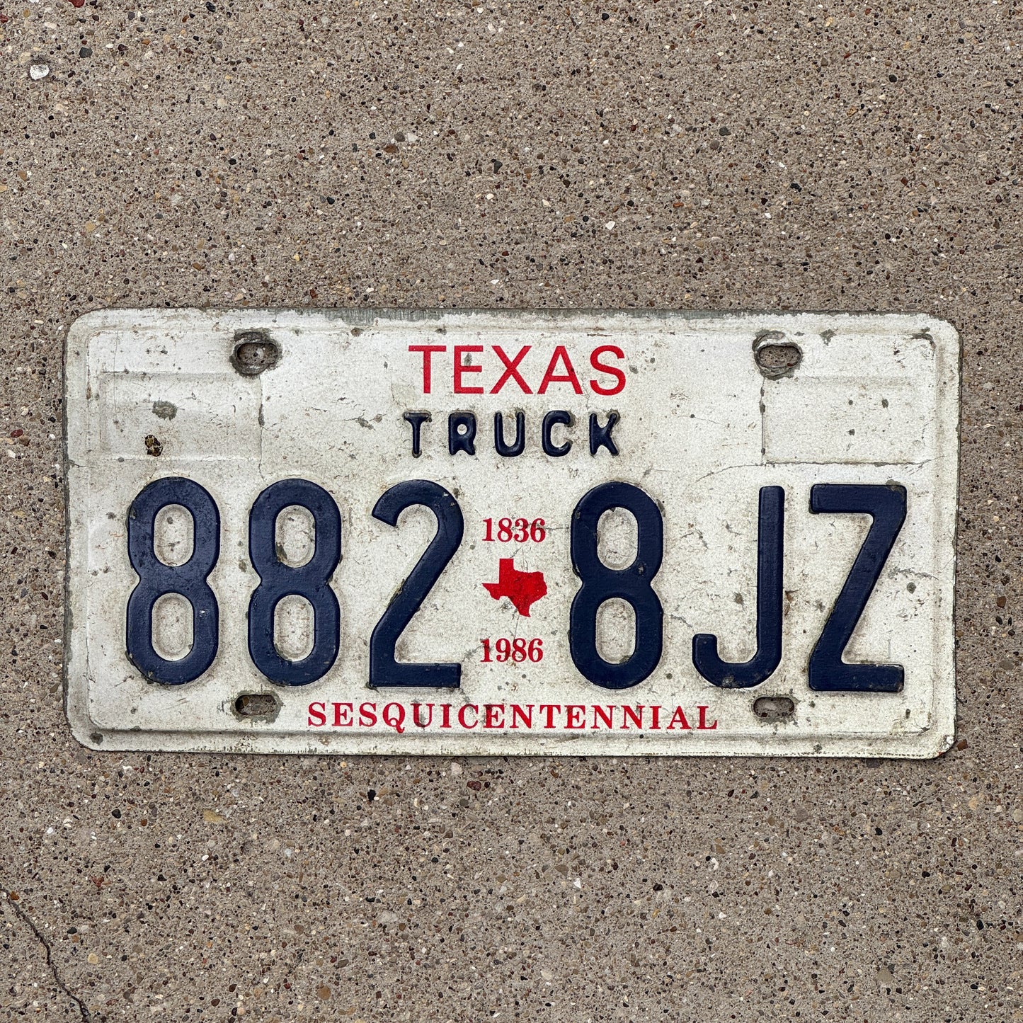 Photo of a 1985 1986 Texas Truck License Plate Auto Tag Garage Decor Vintage 882 8 JZ with original patina