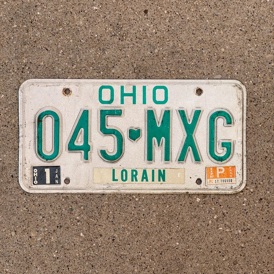 Photo of a 1985 1987 Ohio License Plate Auto Tag 1 Vintage Garage 045 MXG with original patina