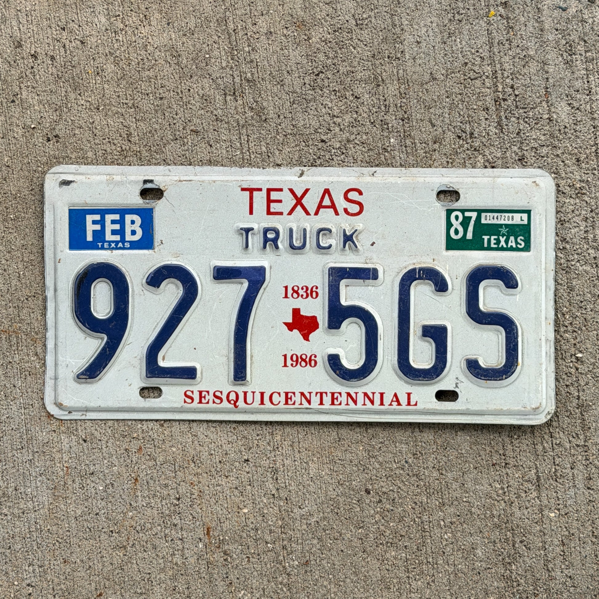Photo of a 1985 1987 Texas Truck License Plate Auto Tag Garage Decor Vintage 927 5 GS with original patina