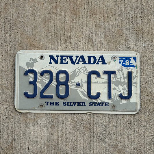 Photo of a 1985 1989 Nevada License Plate Auto Tag 2 Vintage Garage 328 CTJ with original patina