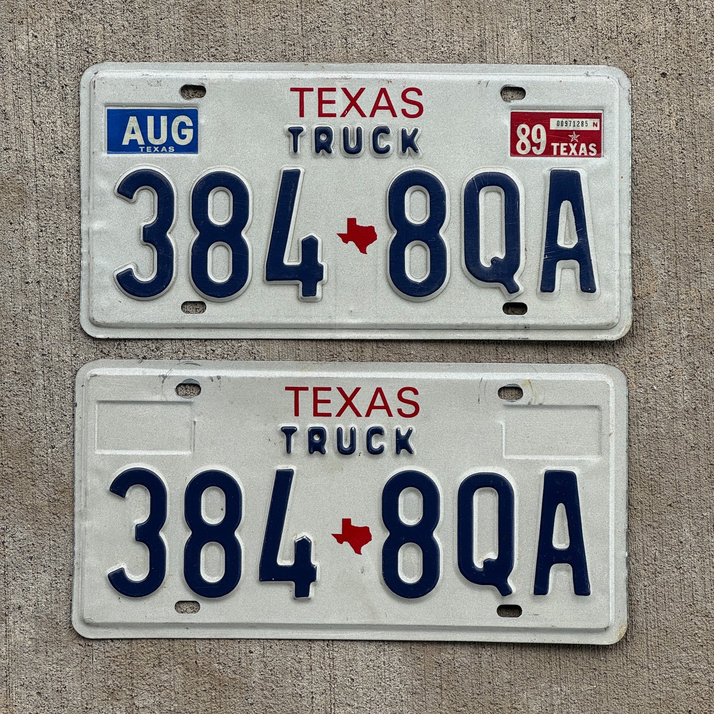 Photo of a 1985 1989 Texas Truck License Plate Pair Auto Tag Garage Decor Vintage 384 8QA with original patina
