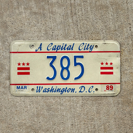 Photo of a 1985 1989 Washington DC License Plate Auto Tag Garage Decor Vintage Reserved Low Number Three Digit 385 with original patina