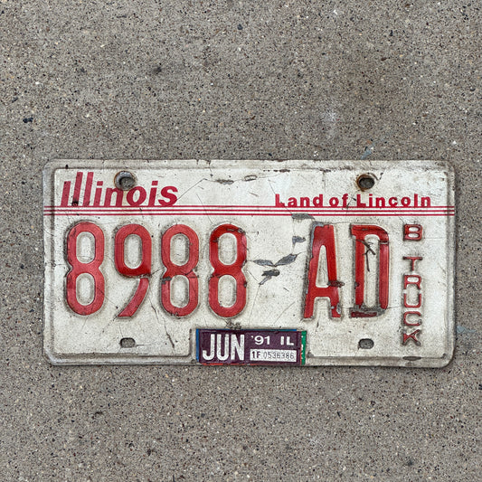 Photo of a 1985 1991 Illinois Truck License Plate Auto Tag Garage Decor Vintage 8988 AD with original patina