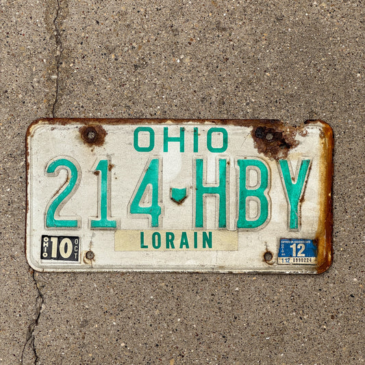 Photo of a 1985 1991 Ohio License Plate Auto Tag 1 Vintage Garage 214 HBY with original patina